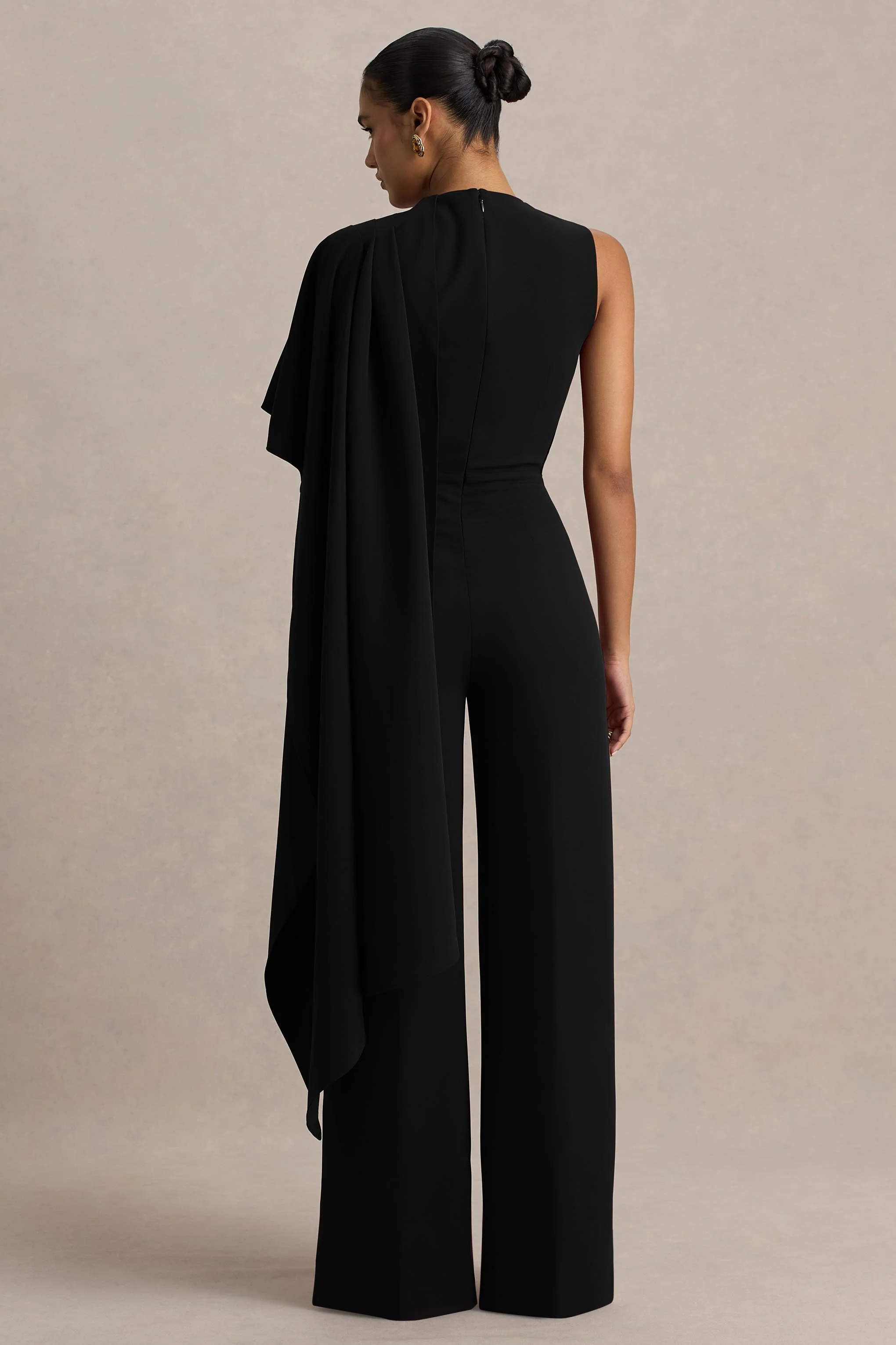 Sorenia | Black High-Neck Jumpsuit With One-Cape Sleeve - Image 2